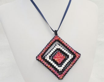 Art Deco Pendant Tutorial. Peyote stitch pendant with moveable layers to match to any outfit, designed by Katie Dean