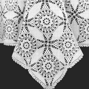 May include: A white, intricately crocheted tablecloth with a detailed floral and geometric pattern. The design features repeating circular and square motifs, with a scalloped edge. The tablecloth is made of a delicate, open-weave fabric.