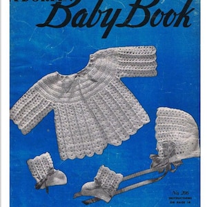May include: A vintage baby book cover with a blue background and white crochet baby clothes. The set includes a sweater, bonnet, and booties. The text reads "A Doreen Baby Book" and "Easy to make."