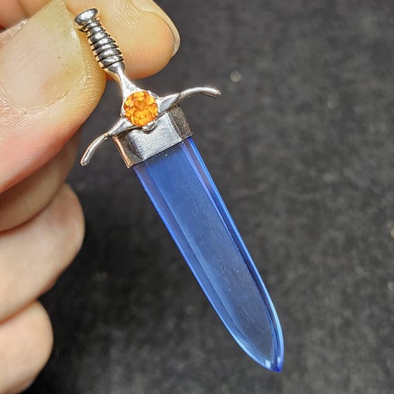 Blue Siberian Quartz Crystal with Hessonite Garnet in Sterling Sword of Stone Pendant SOS5000 Take Up The Sword Cut Through The Darkness