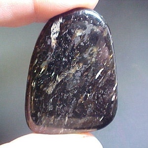 Polished Nuummite Magicians Stone Instilling Strength Protection Perseverance When Going Through Major Changes Easing Transition