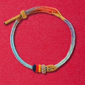 Handwoven Seven Wisdom Rope Bracelet: Cotton-Linen Braided Lucky Charm