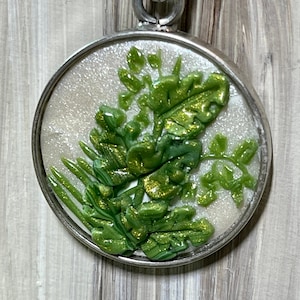 Sterling Silver round bezel polymer clay pendant with tropical leaves, monstera