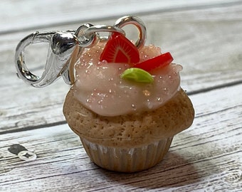 Miniature strawberry cupcake charm with sprinkles and tiny strawberry slices kawaii food