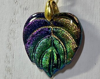 Beautiful color shifting metallic monstera leaf gold pendant Great jewelry gift