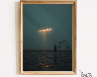 May include: Framed art print featuring a surreal landscape with a person standing before a house. A bright light shines down from above, illuminating the scene. The print is in a gold frame and has the text "PRINTS BY BAPT" in the lower right corner.