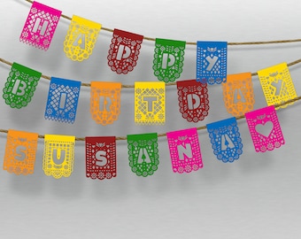 May include: A colorful banner with the words "HAPPY BIRTHDAY SUSANA" cut out of paper. The banner is strung on a rope and features various colors, including pink, yellow, green, and orange. The letters are in silver.