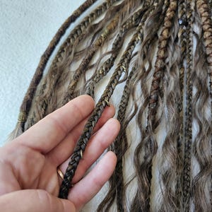 Dreads on Hairband 
Dreadlock Headband 
Dreadlock Extension Pony Tail 
Hair on Elastic Band 
Ponytail Wrap