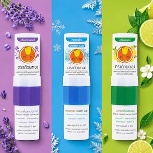 Pode incluir: Três inaladores com bases de cores diferentes: roxo, azul e verde. Cada inalador tem um topo branco com texto e um logotipo de taça dourada. O inalador roxo é rotulado "Brand Inhaler Lavender", o azul "Golden Cup" e o verde "Brand Inhaler Lemon Scent".