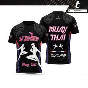 May include: Black short-sleeved t-shirt with a white Muay Thai design. The front of the shirt features two figures in a fighting stance with the text "Muay Thai" in Thai and English. The back of the shirt features the text "Muay Thai" in red and white with a Thai flag.