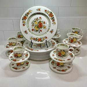 Villeroy and Boch “Summer Day”. Made in Germany. Dinner plates, Demitasse cups/saucers, and coffee cups and saucers.