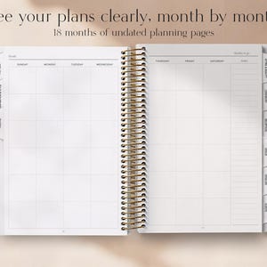 May include: An open, spiral-bound planner with a gold coil and white pages. The planner is open to a monthly spread with grid lines for each day of the week. Text at the top reads "See your plans clearly, month by month" and "18 months of undated planning pages."