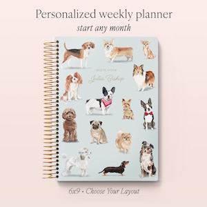 May include: A spiral-bound weekly planner with a light blue cover featuring various dog breeds in watercolour style. The text reads Personalized weekly planner, start any month, 2022 PLANNER, Julia Bishop, and 6x9 • Choose Your Layout.