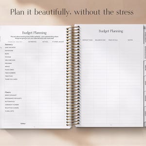 May include: Open notebook with a gold spiral binding, featuring budget planning pages. The text "Plan it beautifully, without the stress" is at the top. The pages are divided into sections for stationery and flowers, with columns for estimates and actual costs.