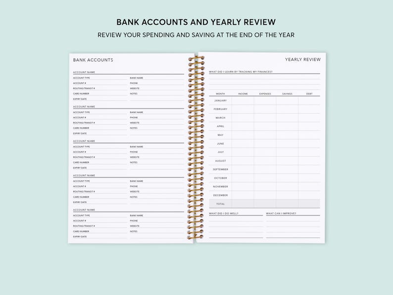 May include: A white planner with a gold spiral binding. The left page has a section for bank accounts with headings for account name, account type, routing transit, card number, expiry date, and notes. The right page has a section for yearly review with headings for what did I learn by tracking my finances, month, income, expenses, earnings, debt, what did I do well, and what can I improve.