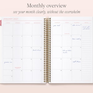 a spiral-bound notebook with a Monthly overview page, showing a calendar for January 2023 and a Monthly overview page with a list of tasks and events.