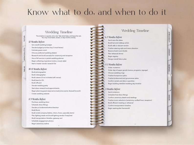 May include: Open wedding planner with a spiral binding, featuring a detailed wedding timeline. The pages are white with black text, and the planner includes sections for planning 12, 10-11, 8-9, 6-7, 4-5, and 3 months before the wedding.