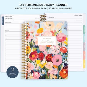 May include: A 6x9 personalized daily planner with a floral design featuring a variety of colorful flowers. The planner has a gold wire-o binding and includes the text "2023 Planner Julia Bishop".