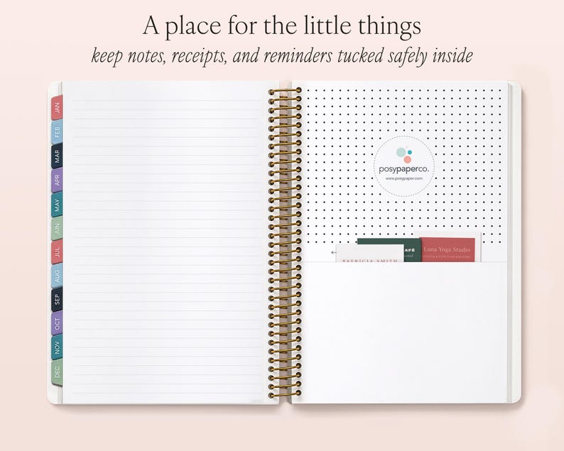 an open spiral-bound notebook with a blank page, a pocket on the right side, and a section of the notebook with a logo and text visible.