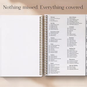 May include: An open wedding planner with a gold spiral binding. The planner's pages are white, and the right side displays a detailed table of contents, including sections for planning, vendors, and the wedding day. The text "Nothing missed. Everything covered." is at the top.