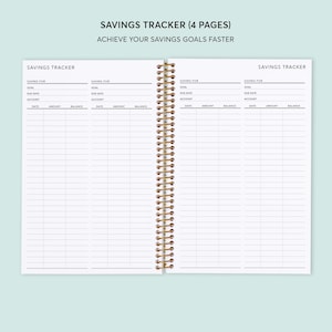 May include: A white spiral bound notebook with the text "Savings Tracker (4 Pages)" and "Achieve Your Savings Goals Faster" on the cover. The notebook has four pages for tracking savings goals.