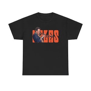 Celebrate Jazz History with Our Unisex Heavy Cotton Shirt Honoring the Legendary Miles
