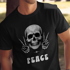 T-shirt schedel vredesteken, uniek grafisch T-shirt, artistiek hippieshirtontwerp, edgy streetwear, retro vredesschedeltop, halloweenshirt