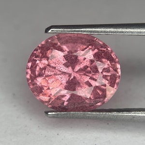 4.37 Ctw Lab Pink Sapphire (Czochralski) Oval Shape w/ inclusions, 10 x 8.5 (mm)
