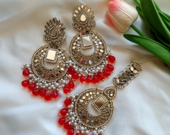 Pendientes de espejo y Tikka