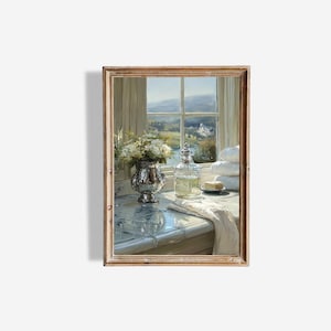 May include: A framed painting depicts a serene bathroom scene. A silver vase holds white flowers, next to a glass bottle and a stack of white towels. The window reveals a scenic landscape with a river and a distant building.