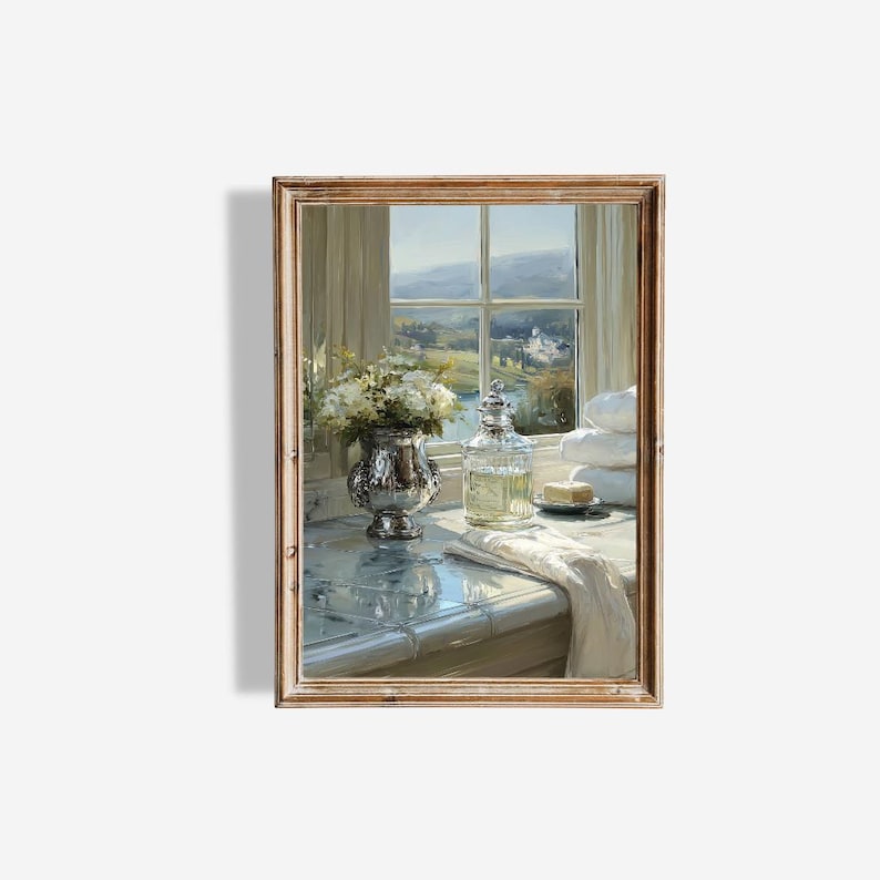 May include: A framed painting depicts a serene bathroom scene. A silver vase holds white flowers, next to a glass bottle and a stack of white towels. The window reveals a scenic landscape with a river and a distant building.
