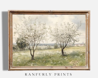 May include: A framed painting of a landscape with two trees in bloom. The trees are in the foreground, with a field of wildflowers behind them. The sky is a light blue with white clouds. The painting is in a wooden frame.