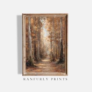 Könnte beinhalten: Gerahmtes Landschaftsgemälde, das einen Weg durch einen Wald aus hohen Bäumen mit goldbraunen Blättern zeigt. Das Kunstwerk hat eine Vintage-Ästhetik, mit dem Text "RANFURLY PRINTS" unten.