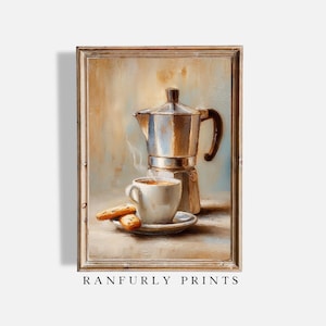 Può includere: Una stampa incorniciata di una natura morta con una caffettiera argentata, una tazza da caffè bianca su un piattino e due biscotti. Lo sfondo è una miscela di toni beige e marrone. Il testo "RANFURLY PRINTS" è in basso.