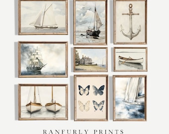 May include: Nine framed watercolor prints with nautical themes, including sailboats, an anchor, and butterflies. The prints are in wooden frames and arranged on a white background. The text "RANFURLY PRINTS" is at the bottom.