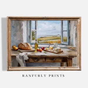 Puede incluir: Impresión enmarcada de una pintura de naturaleza muerta con una mesa de madera rústica, pan, manzanas, queso y una botella de aceite. Una ventana revela un paisaje. El texto "RANFURLY PRINTS" está en la parte inferior.