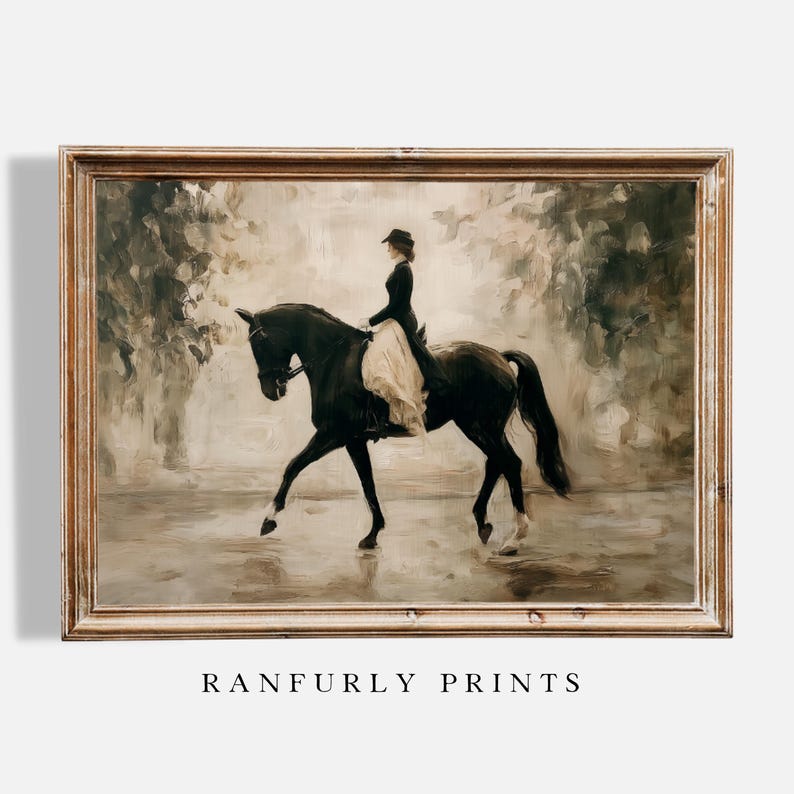 May include: A framed vintage-style print depicts a person riding a black horse. The rider wears a dark coat and hat with a light-colored skirt. The artwork has a muted color palette with the text "RANFURLY PRINTS" at the bottom.