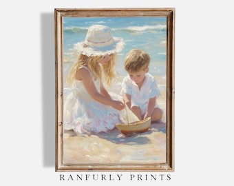 May include: A framed painting depicts two children playing with a toy sailboat on a beach. The girl wears a white dress and hat, while the boy is in a white shirt. The artwork is signed "RANFURLY PRINTS" at the bottom.