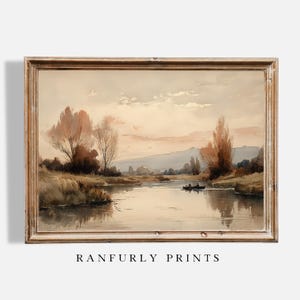 May include: A framed landscape print featuring a serene river scene with a boat, trees, and a soft, muted color palette. The artwork has a vintage aesthetic, with the text "RANFURLY PRINTS" at the bottom.