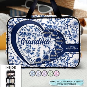 May include: A white and blue floral travel bag with a navy blue heart design that says "Grandma". The bag has a black handle and includes names in heart shapes. The text "NAME, TITLE & NUMBER OF HEARTS CAN BE CUSTOMIZED" is also visible.