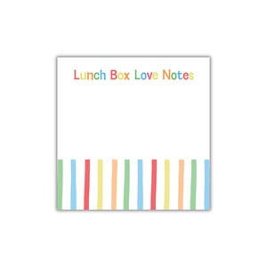 May include: A square notepad with a white background featuring the text Lunch Box Love Notes in multicolored letters at the top. The bottom section displays a series of vertical stripes in alternating pastel colors including green, blue, red, yellow, and orange.