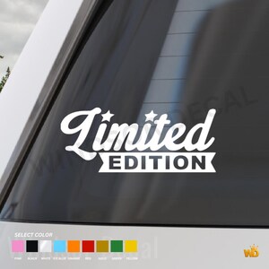 May include: A white vinyl decal applied to a car window featuring the text Limited EDITION in a bold, stylised font. The word Limited is written in a cursive script with two small stars above it, while EDITION is in block letters on a banner.