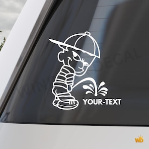 May include: White vinyl decal of a cartoon boy wearing a baseball cap and striped shirt, urinating. The decal includes the text "YOUR-TEXT". The image is on a car window.