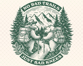 May include: A green and white illustration features two bears hiking with backpacks and walking sticks. The text reads "NO BAD TRAILS" above and "JUST BAD KNEES" below. The image is framed by pine trees and mountains. The image is 15" x 15".