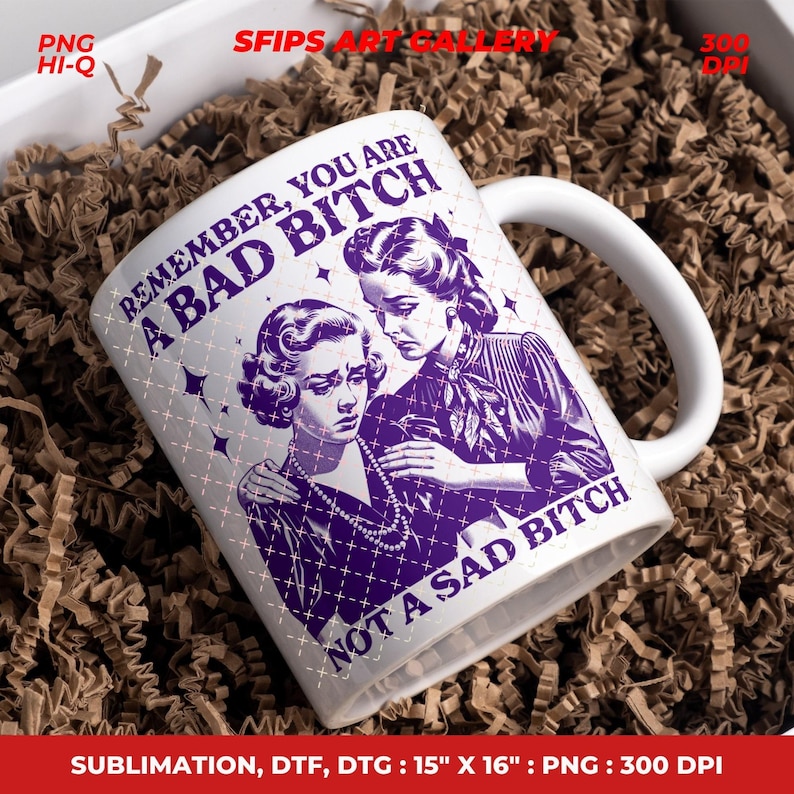 May include: White ceramic mug with a purple graphic of two women and the text "REMEMBER, YOU ARE A BAD BITCH NOT A SAD BITCH". The mug has a white handle and is surrounded by brown packing material.