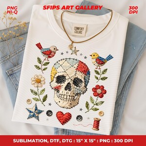 May include: White t-shirt with an embroidered skull design, featuring colorful patchwork, birds, flowers, stars, and a heart. The shirt includes the text "SFIPS ART GALLERY" and "COMFORT COLORS". The design is 15" x 15".