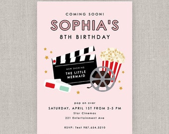 May include: Pink invitation with a movie theme for Sophia's 8th birthday party. The invitation features a clapperboard, film reel, popcorn, and 3D glasses. The text reads "Coming Sooni Sophia's 8th Birthday" and "Now Showing The Little Mermaid".