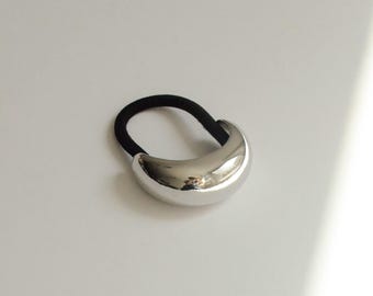 Coletero metálico con forma de media luna estrecha / Plateado