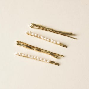 Forcine per capelli in metallo con perline di perle d'acqua dolce / Set di 4