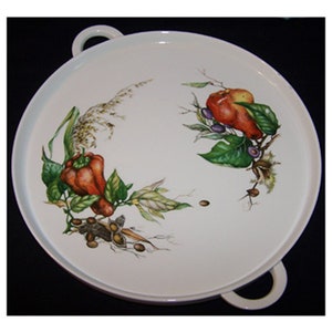 May include: White ceramic serving tray with two handles. The tray features a hand-painted design of red peppers, green leaves, and brown seeds.